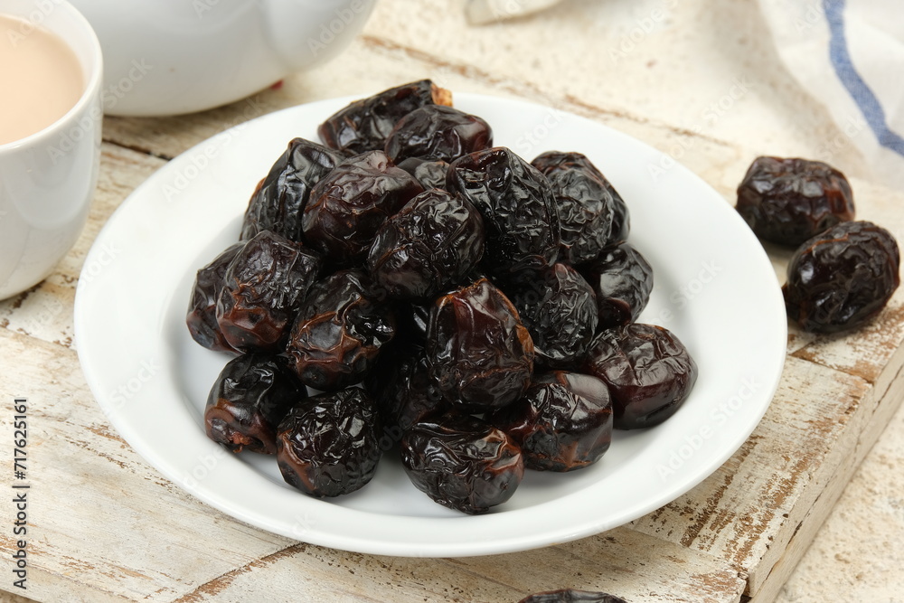 Kurma Ajwa or Ajwa Date Traditional Ramadan Iftar Meal. Ramadan Kareem Fasting Month Concept Kurma Ajwa or Ajwa Date Traditional Ramadan Iftar Meal. Ramadan Kareem Fasting Month Concept