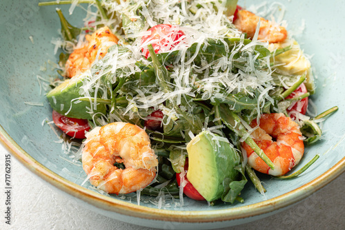 Portion of gourmet caesar salad with shrimp photo