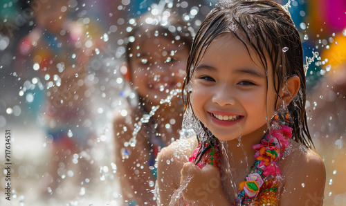 Songkran Festival laos girls splashing water during festival Songkran festival.