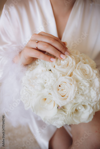 bride holding bouquet of flowers. High quality photo