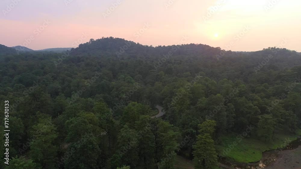 Experience the breathtaking beauty of nature with our mesmerizing drone video capturing a stunning sunset over a lush jungle. Watch as the vibrant hues of the sky reflect in the tranquil river, creat
Experience the breathtaking beauty of nature with our mesmerizing drone video capturing a stunning sunset over a lush jungle. Watch as the vibrant hues of the sky reflect in the tranquil river, creat