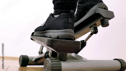 Wallpaper Mural Young woman exercises on the stepper, Video Clip Torontodigital.ca