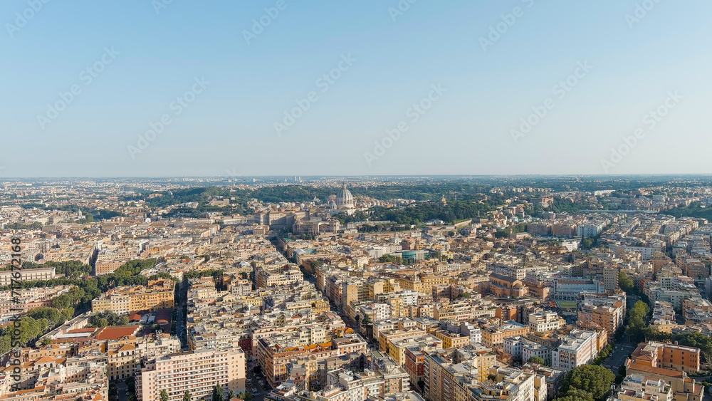 Rome, Italy. View of the Vatican. Dome of the Basilica di San Pietro, Flight over the city. Evening time, Aerial View
