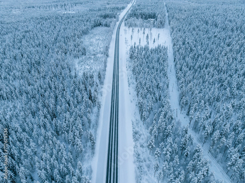 Aerial view of beautiful winter landscape in Lapland during sunset. photo