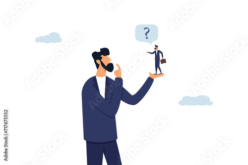 Curious businessman asking himself for answer with big question mark. Ask yourself a question, process for self improvement, problem solving or review and evaluation concept.