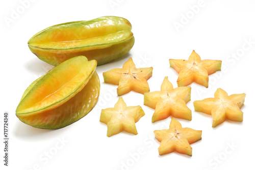 Separate sliced and two whole fresh organic star fruit delicious isolated on white background clipping path