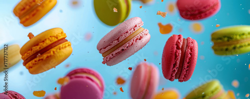Colorful macarons cookies. french cakes. sweet and colorful french macaroons fall or fly in motion.