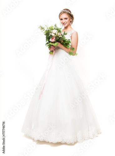 Young pretty bride with wedding bouquet