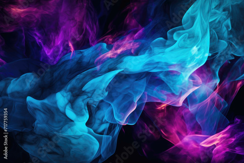 a blue and purple flame against a black background photo