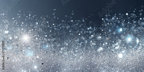 abstract modern background with a scattering of bright shiny grains of silver tone design and advertising concept