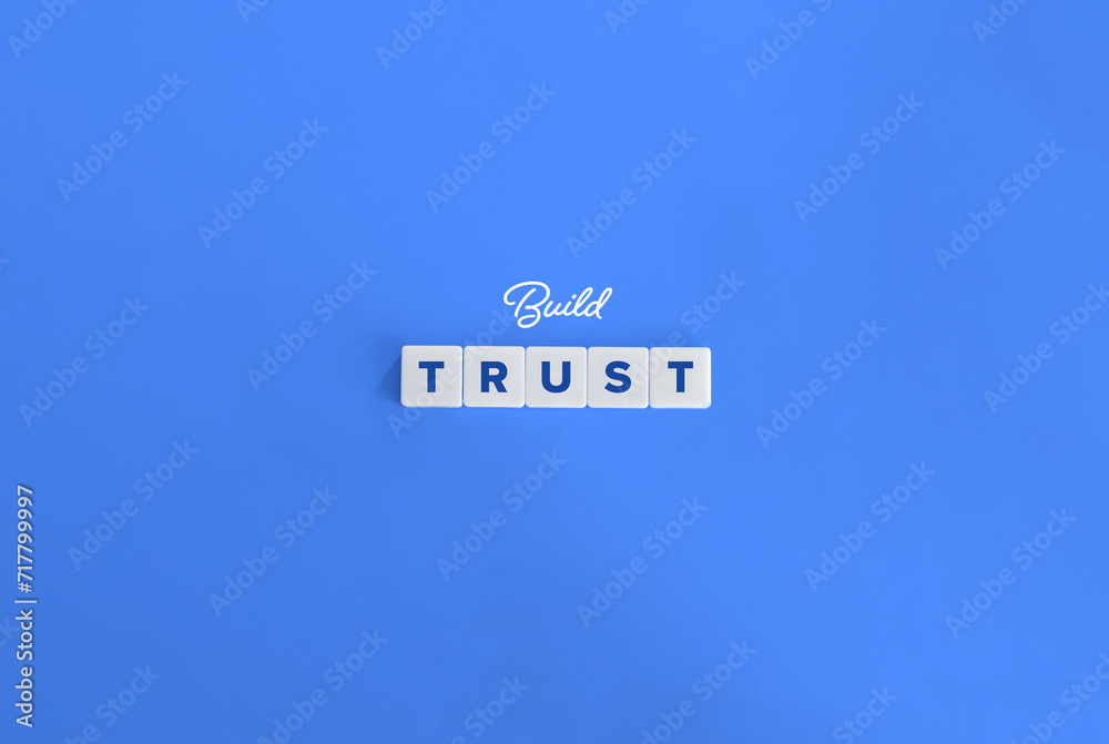 How to Build Trust Banner. Block Letter Tiles and Cursive Text on Blue Background. Minimalist Aesthetics. How to Build Trust Banner. Block Letter Tiles and Cursive Text on Blue Background. Minimalist Aesthetics.