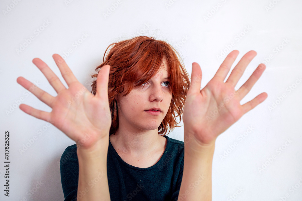 portrait of a beautiful teenage girl with a stylish short anime hairstyle on a light background portrait of a beautiful teenage girl with a stylish short anime hairstyle on a light background