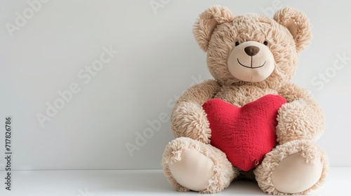 A large plush bear and a heart-shaped pillow for valentines