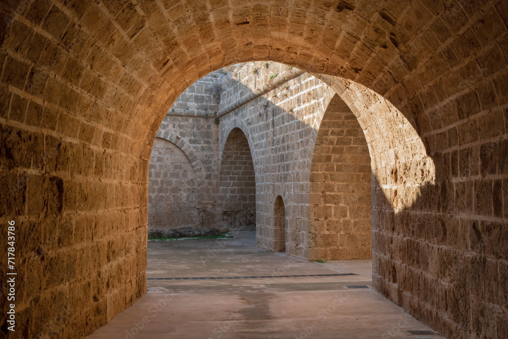 Tunnel passages and walls made of cut stone under Othello Castle. Cyprus historical places. Tunnel passages and walls made of cut stone under Othello Castle. Cyprus historical places.