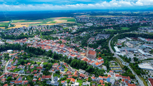 Aerial view around the town Neuoetting in Germany on a cloudy day in summer