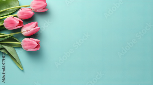 Bouquet of spring pink tulip on pastel blue background, spring flowers for gift, 8 March, Valentine day, Birthday party, International women day, 14 February, Easter, Copy space image Place for text photo