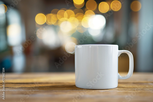 Photo of plain white mug on table