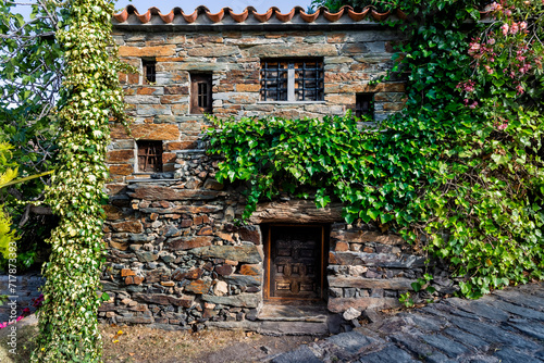 Typical house with ivy in Patones de Arriba. Madrid. Spain. Europe.