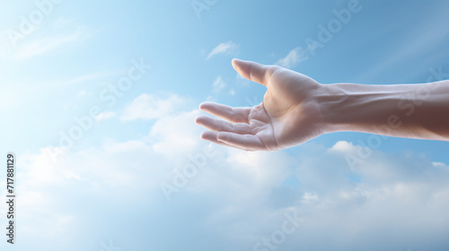 Helping hand with the sky background.