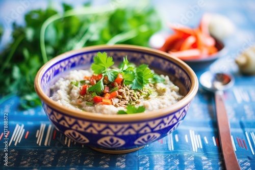 hearty baba ganoush in a colorful ethnic patterned bowl photo