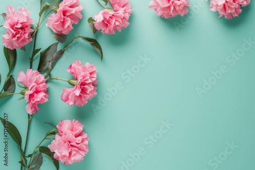 Valentine's day A serene and inviting floral arrangement of pink roses and chrysanthemums delicately placed on a refreshing mint green background central negative space text or design elements