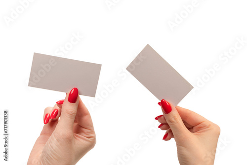 Canvas Print Empty card in woman hand with red nails  isolated on a white background