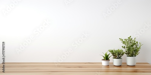 Product display setup with empty wooden table top on white background