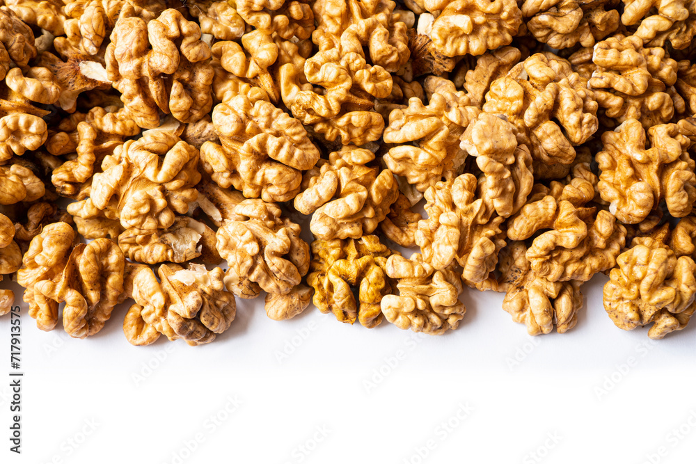 Walnuts background. Kernels walnuts. Top view. Vegetarian or healthy eating. A bunch of walnuts. Walnuts background. Kernels walnuts. Top view. Vegetarian or healthy eating. A bunch of walnuts.