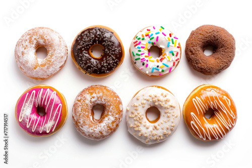 Delicious donuts arranged on a pristine white surface