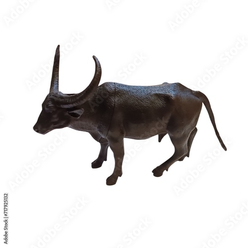 Plastic black bull stands on a white background and 