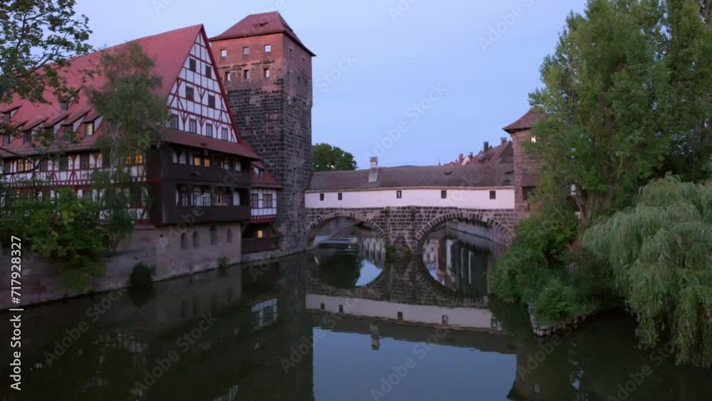 Beautiful static clip of Wasserturm in Nuremberg Germany on a still, summer evening twilight.