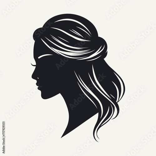 Silhouette of a woman's head with hairstyle. Vector illustration.