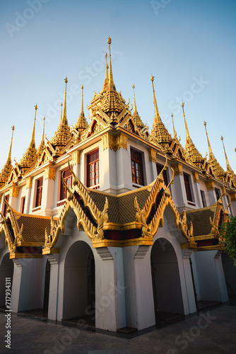 Obraz na płótnie Stunning view of the Wat Ratchanatdaram, a beautiful Buddhist temple that stands proud in the heart of downtown Bangkok, Thailand. w salonie