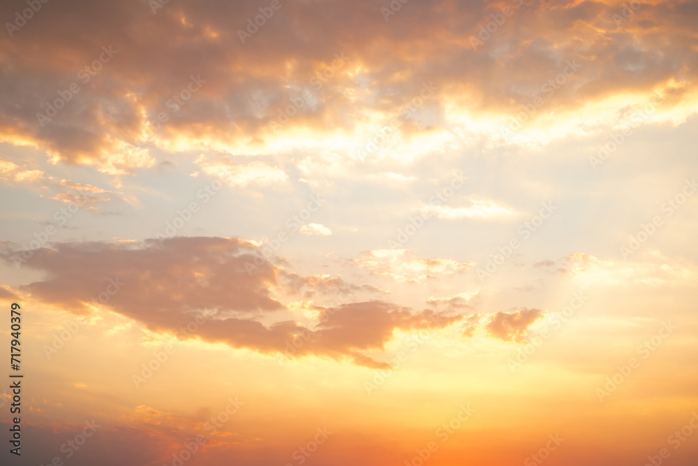 Beautiful , luxury soft gradient orange gold clouds and sunlight on the blue sky perfect for the background, take in everning,Twilight, Large size, high definition landscape photo Beautiful , luxury soft gradient orange gold clouds and sunlight on the blue sky perfect for the background, take in everning,Twilight, Large size, high definition landscape photo