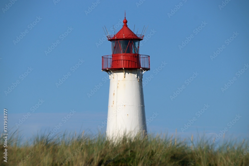 Lighthouse red white on dune. Sylt island – North Germany Lighthouse red white on dune. Sylt island – North Germany