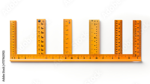 School rulers in inches and centimeters set apart on a white background