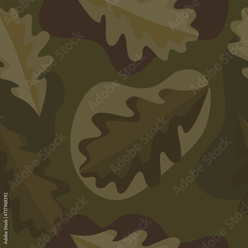 Seamless pattern of autumn oak leaves on camouflage green background. Hand drawn vector illustration.