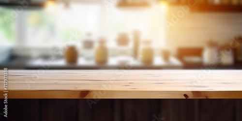 Blurred kitchen background with wooden table top, suitable for product display or design layout.