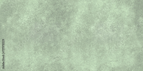 Abstract green painted canvas grungy background texture. cement concrete wall textured. abstract background template works and layout, vintage, retro, grunge, textured.