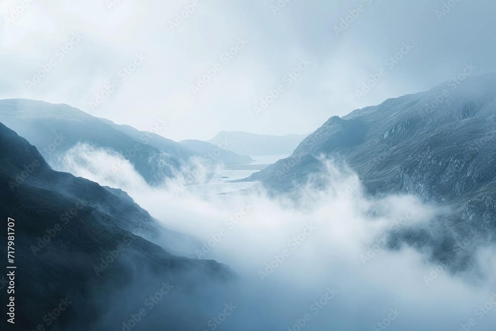 surreal landscape during a dense fog covering a mountainous region.