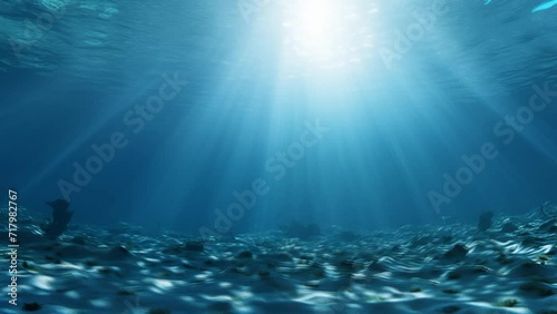 Underwater Background Deep Sea Sun Lighting in the Dark Ocean.mp4 photo