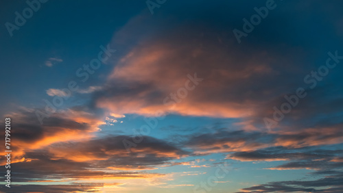 Fototapeta Naklejka Na Ścianę i Meble -  Sunset Sky, Morning Sunrise with colorful Yellow, Orange Sunrise on blue white Cloud, Golden hour Romantic Summer Sky Background.