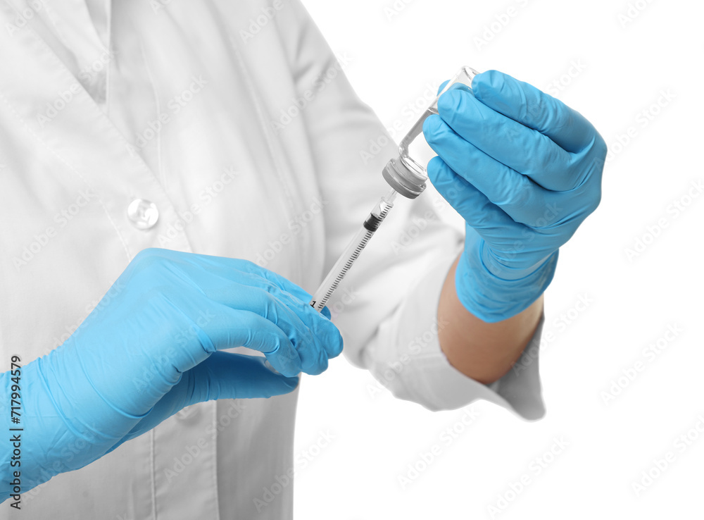 Doctor filling syringe with medication from glass vial on white background, closeup Doctor filling syringe with medication from glass vial on white background, closeup