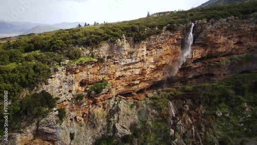 Drone footage of the scenic Tithorea Falls in Velitsa Gorge in Tithorea, Amfikleia-Elateia, Greece photo