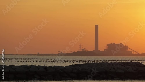 Silhouette Of Power Plant Industry In Map Ta Phut Industrial Estate At Sunset In Rayong, Thailand. wide shot photo
