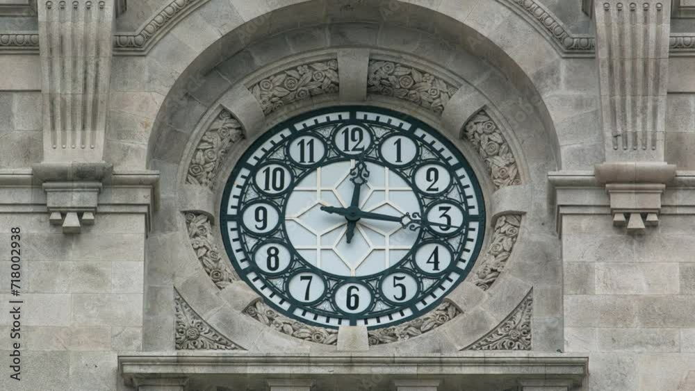 Watch on City Hall building timelapse Camara Municipal do Porto on Liberdade Square, Porto, Portugal. Close up vie to watchface showing time Watch on City Hall building timelapse Camara Municipal do Porto on Liberdade Square, Porto, Portugal. Close up vie to watchface showing time