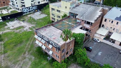 Drone aerial of abandoned derelict building haunted structure urban exploration block Gossy Good Times Gosford Central Coast Australia photo