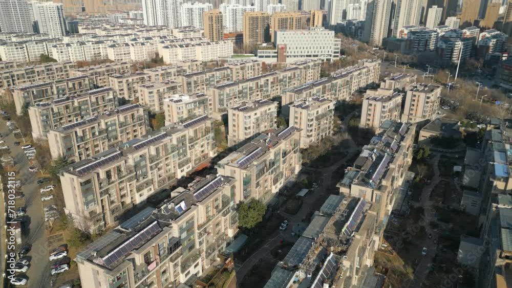 An aerial view captures a residential area in Linyi, Shandong Province, China, embodying the concepts of modernity, urbanization, and the rapid growth of cities. An aerial view captures a residential area in Linyi, Shandong Province, China, embodying the concepts of modernity, urbanization, and the rapid growth of cities.