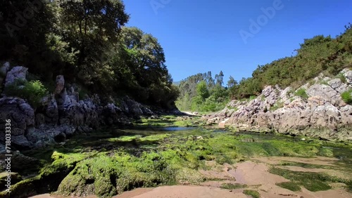 river that flows into the beach of guadamia photo
