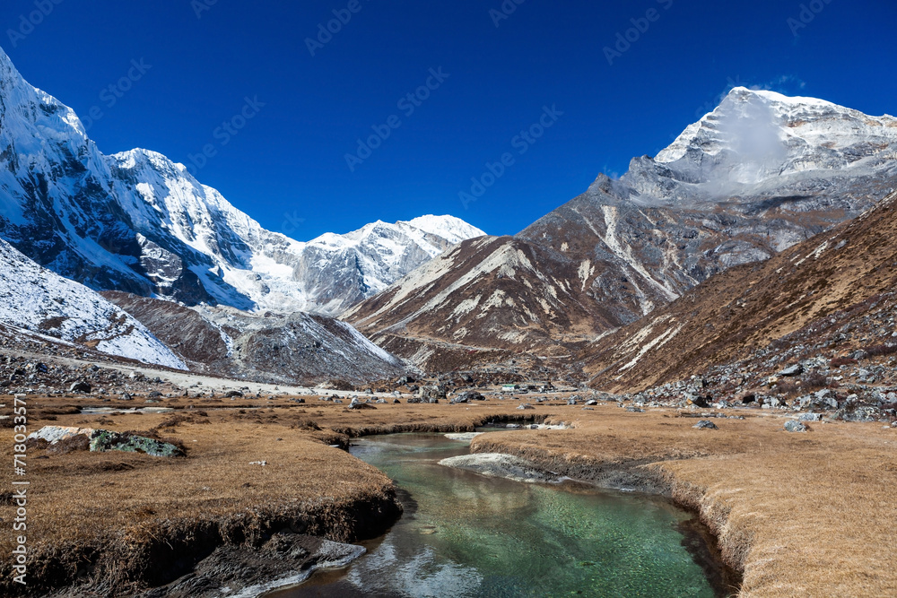 Beautiful Himalayan valley on the way to Tashi Lapcha pass. River stream in Nepal mountains. Landscape in Khumbe valley near Everest Base Camp trek in Nepal.